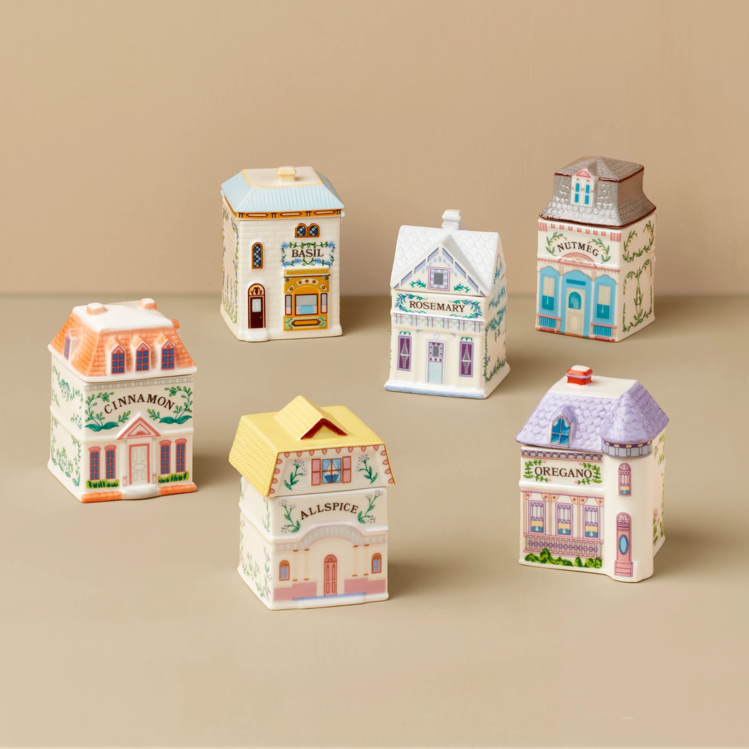 Lenox Spice Village collector’s set featuring intricately designed ceramic spice containers with charming cottage-style details.