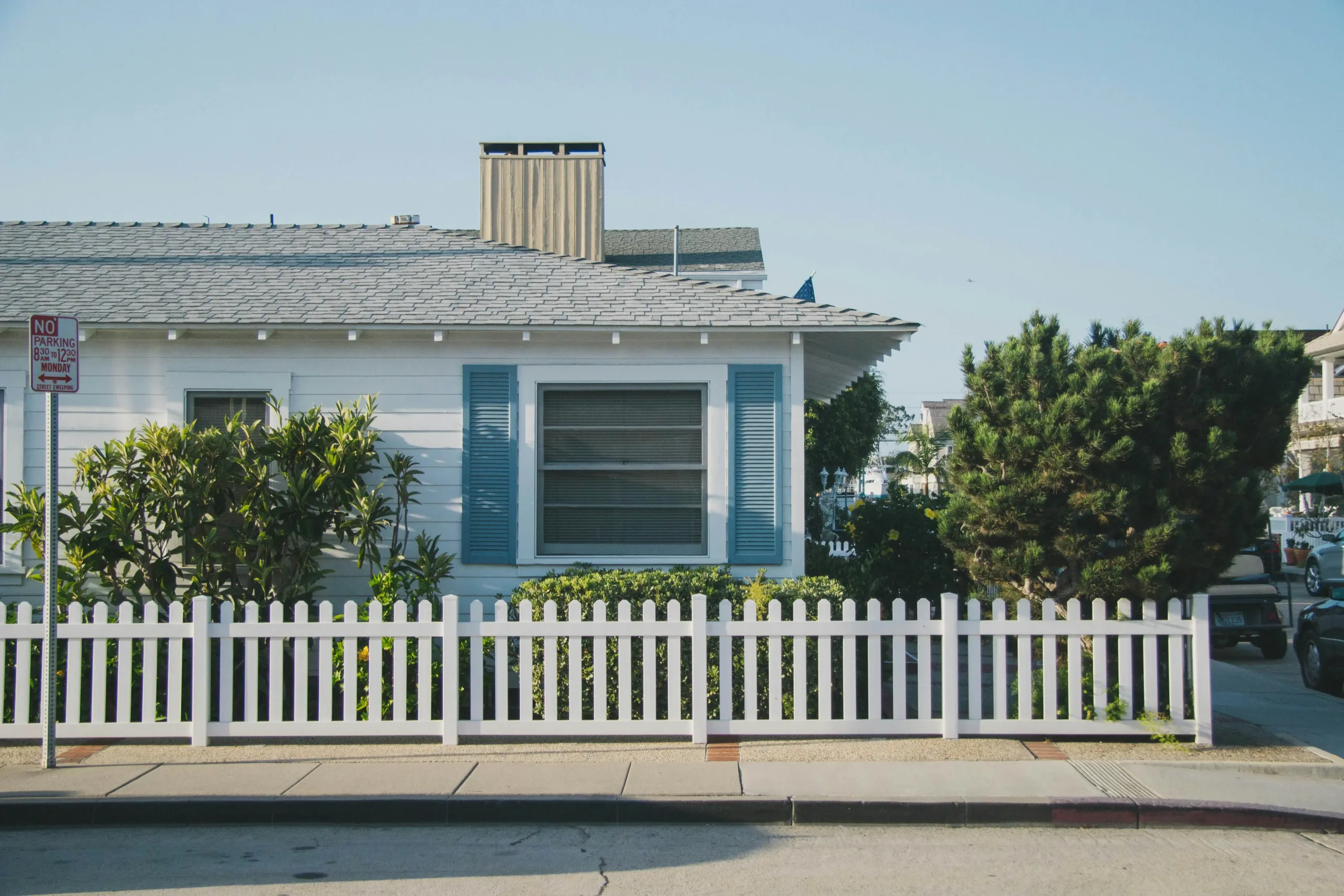 Elegant, modern home exterior with clean lines and sophisticated design, ideal for luxury estate sales and property transitions