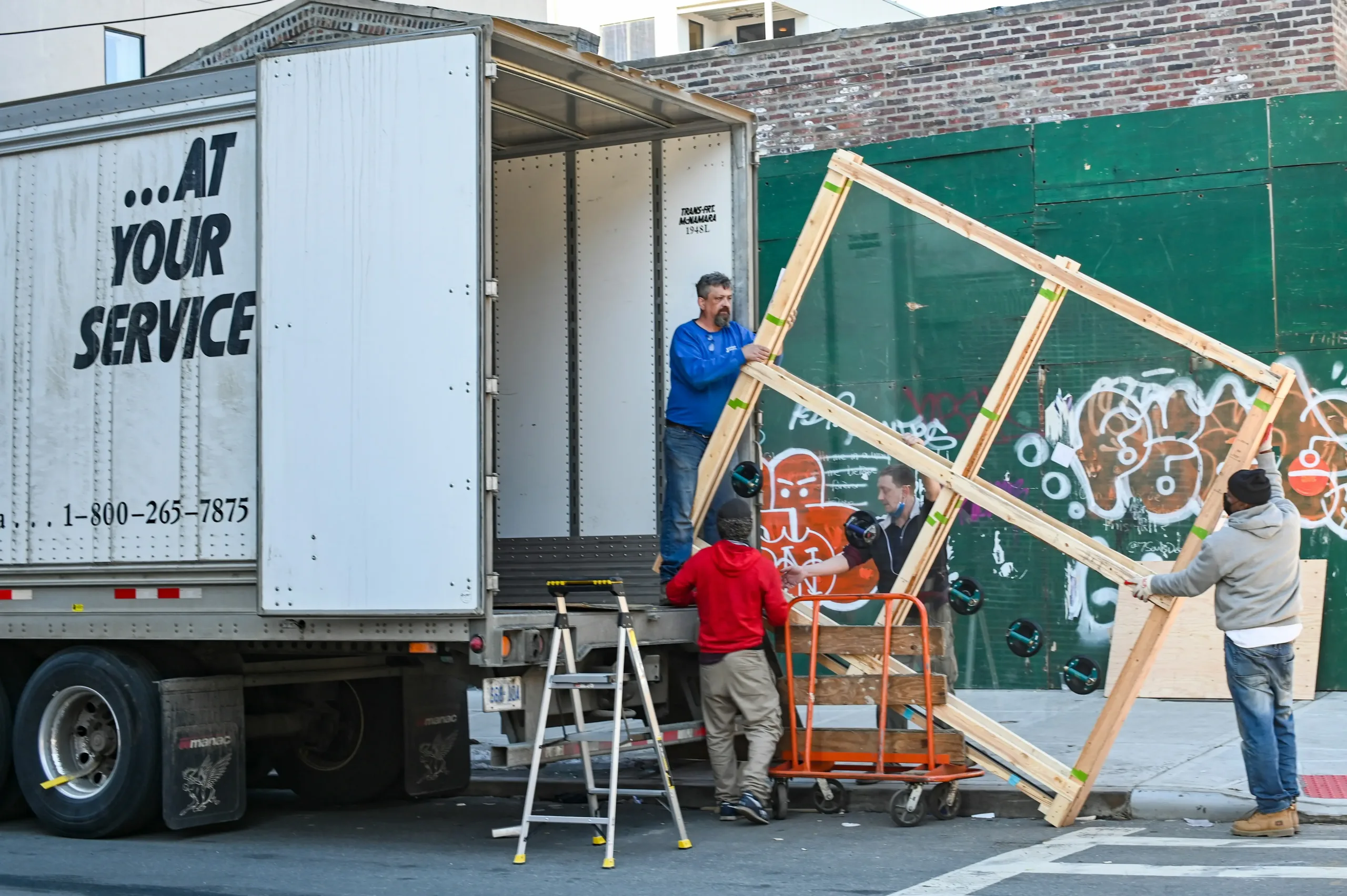 A moving truck loading boxes and household items during an estate liquidation, managed by Messina & Park for a stress-free estate sale process.