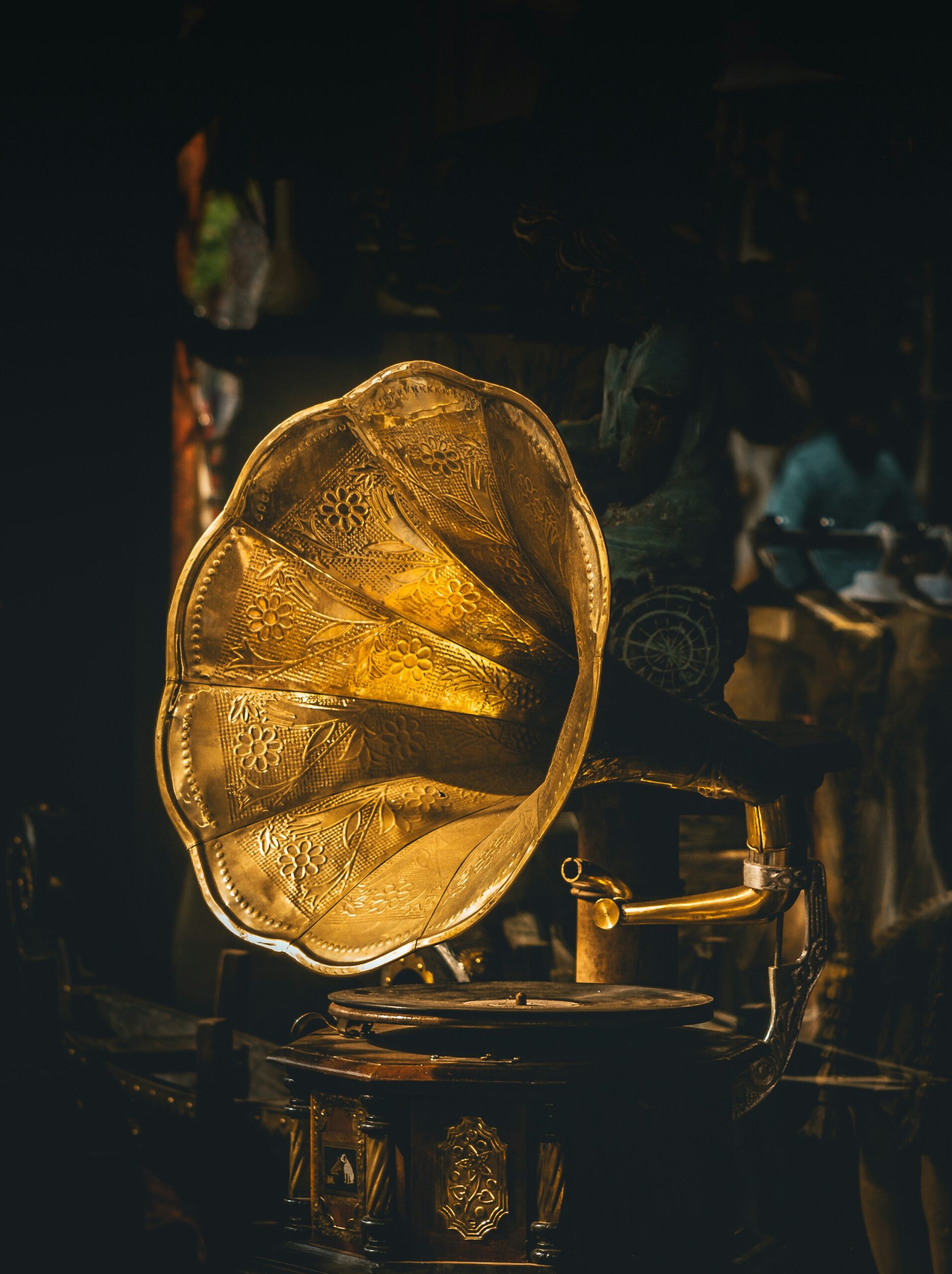Antique Gold Record Player – Rare Collectibles & Estate Sale Finds Elegant gold antique record player with intricate detailing, a rare collectible for vintage music and antique enthusiasts.